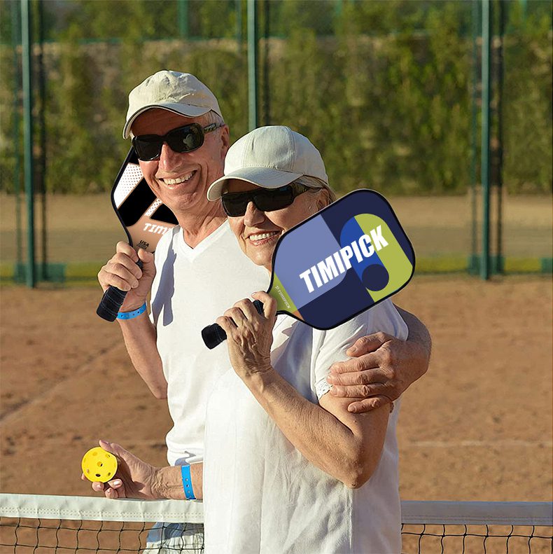 Two players using the pickleball paddle manufacture by timipick sport and their very happy